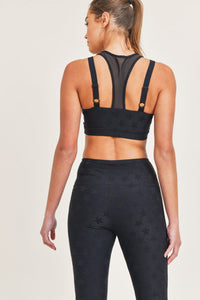 Black Joystar Sports Bra by Fitkitty Culture, shown on a small size, designed for active yoga and workout wear.