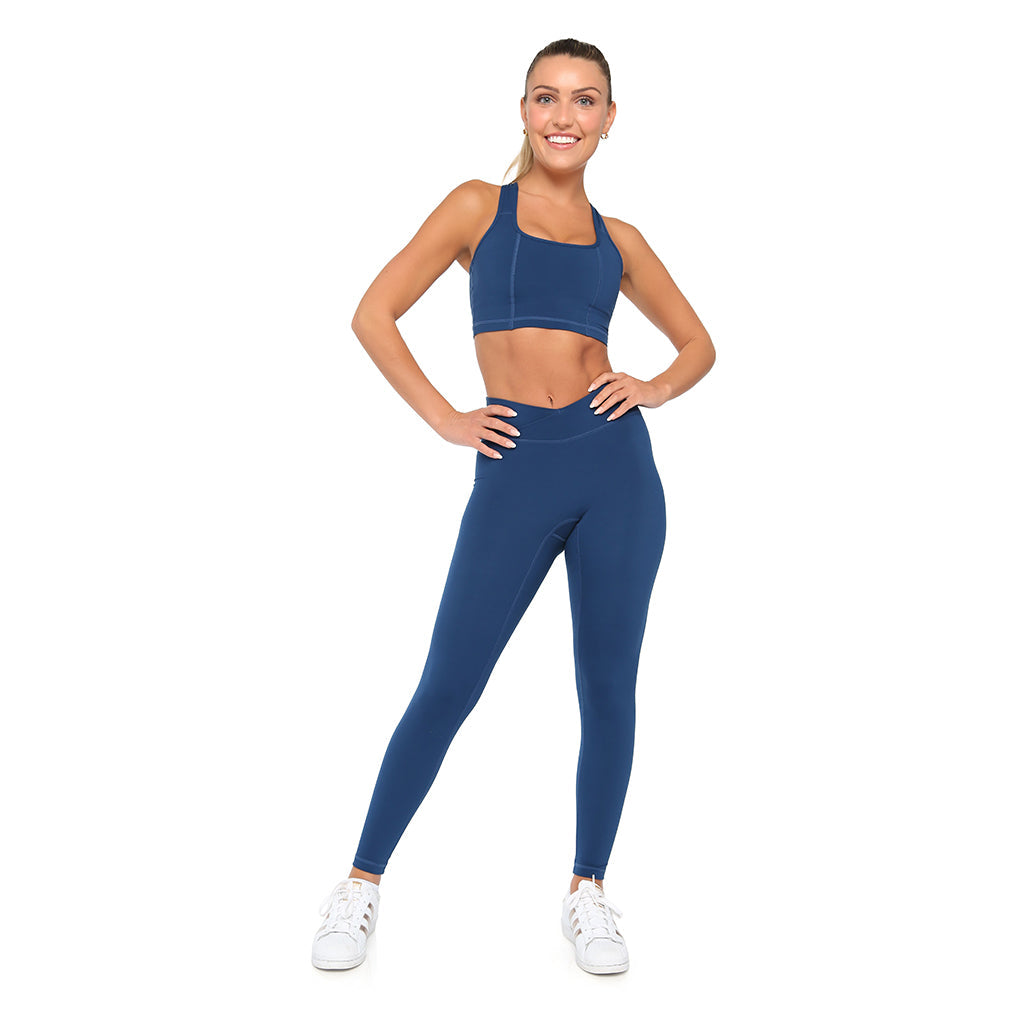 Black SmoothFit™ full coverage sports bra by Fitkitty Culture, designed for support during yoga and active wear.