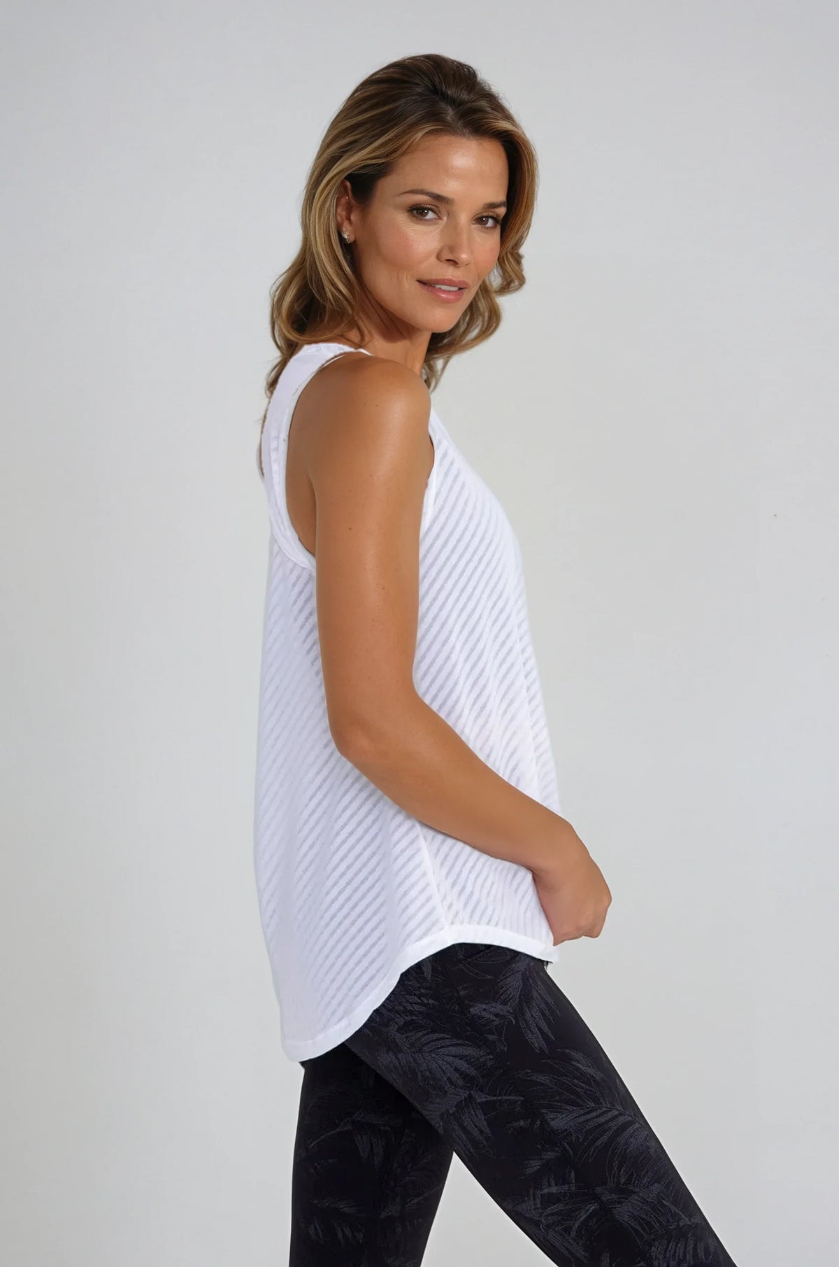 Black sheer striped mesh active tank top with cut-out back by Fitkitty Culture for yoga and athletic wear.