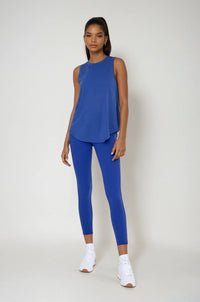 Blue sheer striped mesh active tank top with cut-out back, perfect for yoga and workout wear from Fitkitty Culture Athleisure.