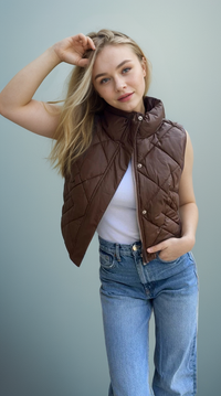 Vegan leather puffer vest from Fitkitty Culture Athleisure Wear, stylish and cozy women's vest in carbon color.