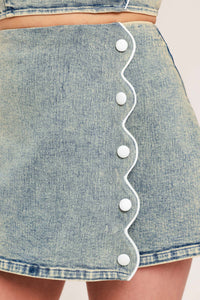 Flying Tomato Sweet Detail Denim Skort shorts with front and back pockets, light blue denim fabric, casual style.