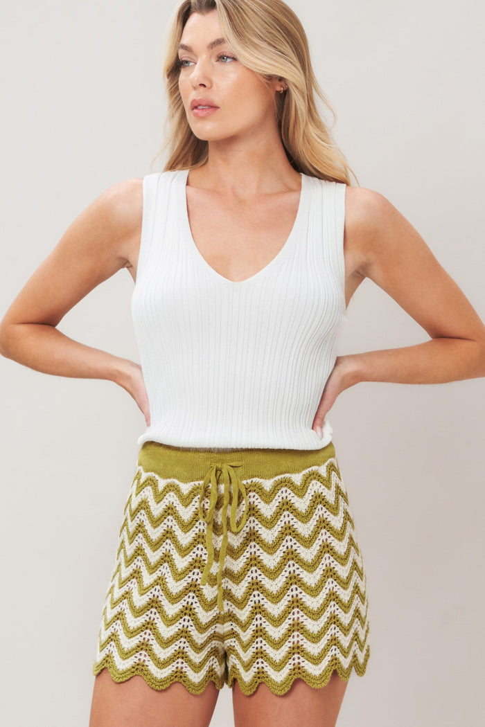 Olive and white crochet knit shorts by Flying Tomato featuring sunset stitch pattern and casual fit.