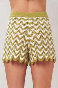 Flying Tomato Sunset Stitch crochet knit shorts in olive white, featuring a relaxed fit and intricate stitch details.
