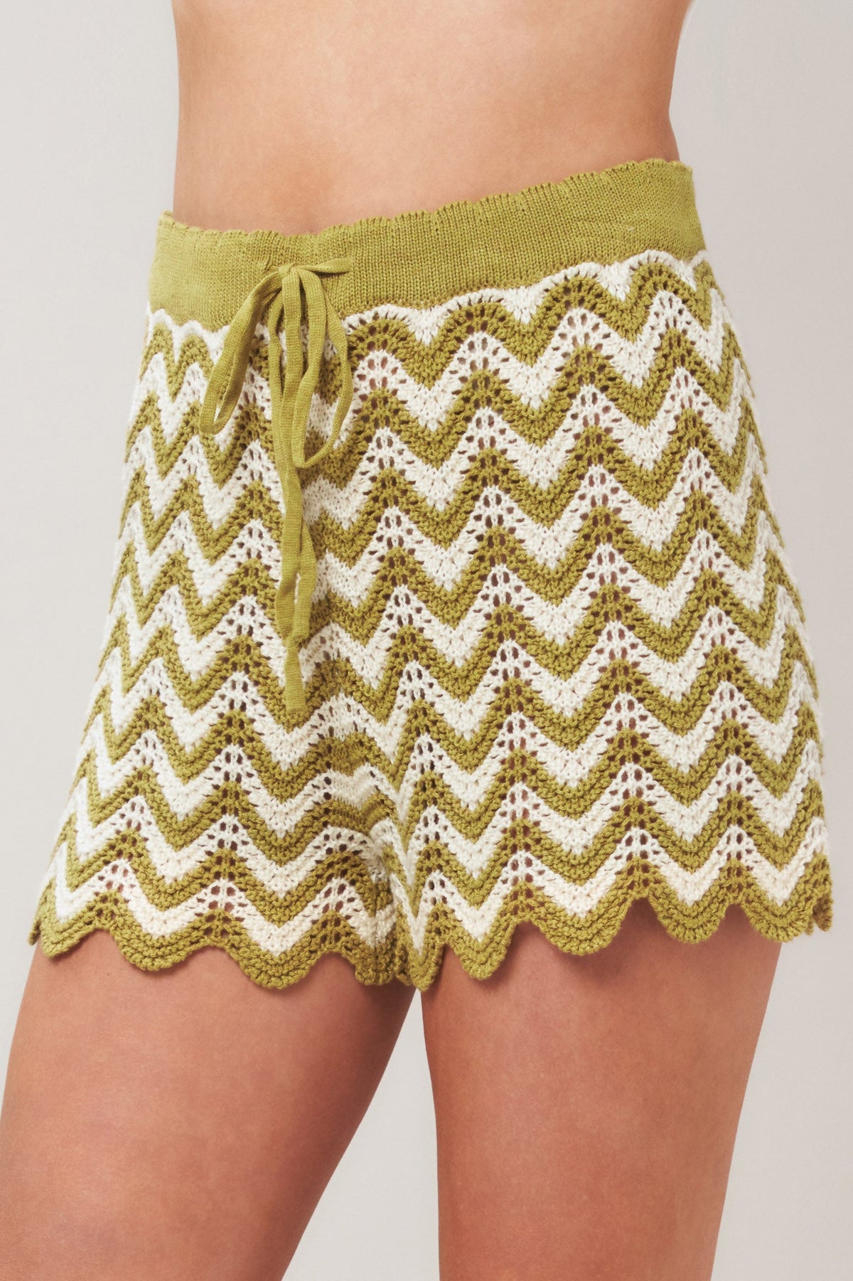 Olive white crochet knit shorts by Flying Tomato featuring a sunset stitch pattern, casual and lightweight for warm weather.