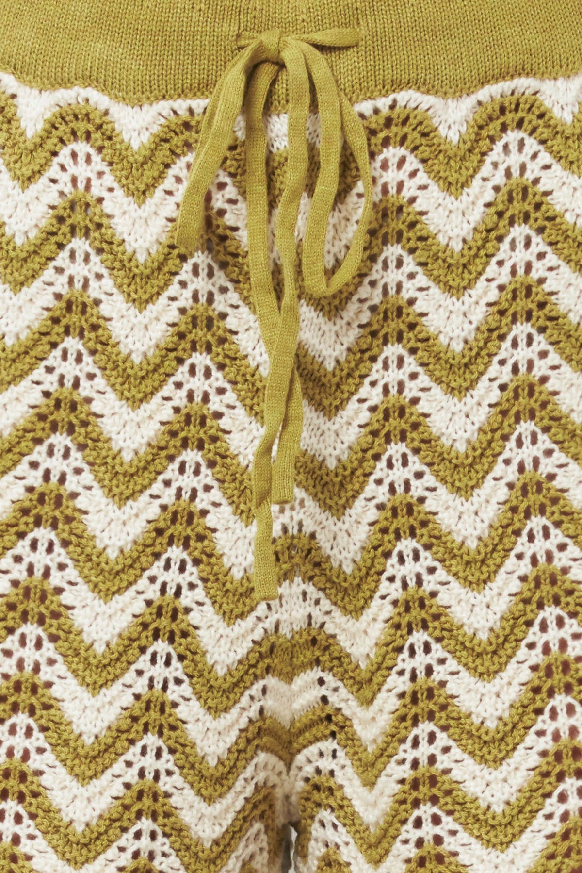 Olive and white crochet knit shorts by Flying Tomato featuring sunset stitch pattern and casual fit.