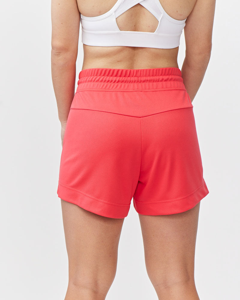 Goal Five G5 Advance 4.5-inch knit shorts in hot coral, featuring a comfortable elastic waistband and casual style.