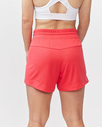Goal Five G5 Advance 4.5-inch knit shorts in hot coral, featuring a comfortable elastic waistband and casual style.