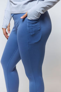 Goal Five Go Again women's full-length leggings shown on a model, featuring a snug fit and comfortable stretch.