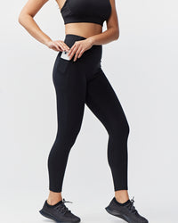 Goal Five Go Again women's full-length black leggings with 7/8 length and a comfortable fit, shown on a model.
