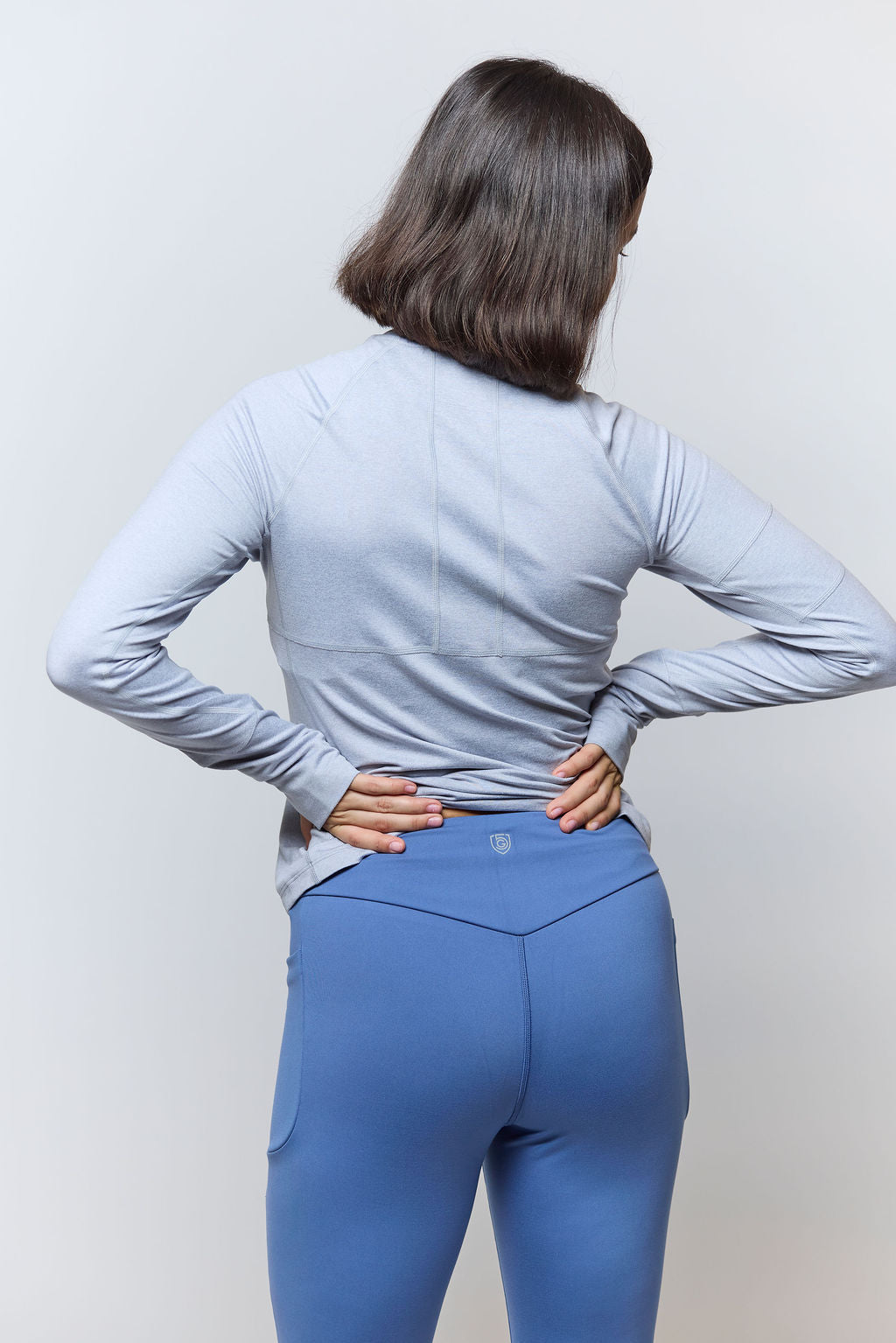Goal Five Go Again women's full-length leggings shown on a model, featuring a comfortable fit and sleek design for activewear.