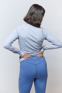 Goal Five Go Again women's full-length leggings shown on a model, featuring a comfortable fit and sleek design for activewear.