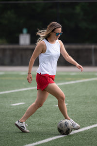 Goal Five boxy crop tank top styled with casual outfit, showcasing its relaxed fit and modern design.