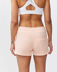 Goal Five Freasy Short lifestyle image showing the comfortable nectar-colored shorts with a relaxed fit and casual style.