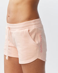 Goal Five Freasy Short in Nectar color, front and side view, showcasing a stylish lifestyle short with comfortable fit.