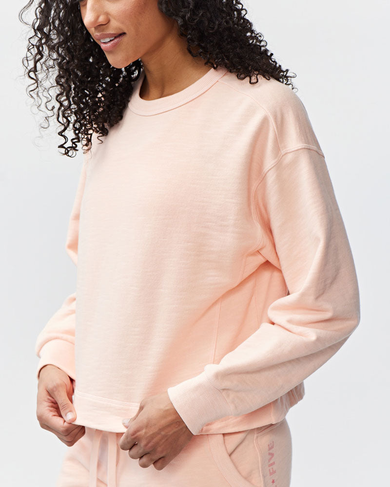 Goal Five Freasy Crew lifestyle sweater in nectar color, featuring a comfortable fit and logo design, shown on a model.