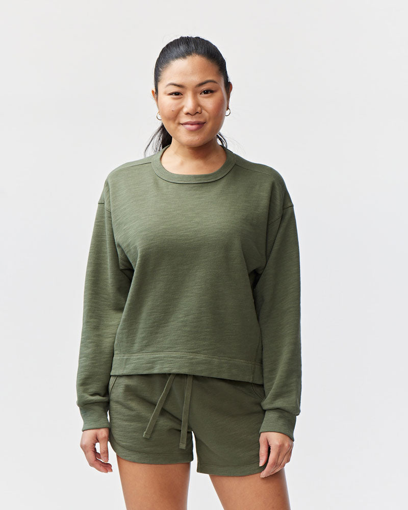 Goal Five Freasy Crew lifestyle sweatshirt in dark moss color, featuring a comfortable fit and casual style.