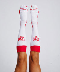 Equal Play women's soccer over-the-calf training socks by Goal Five in hot coral, designed for comfort and performance.
