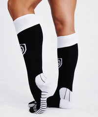 Black Equal Play women's over-the-calf training soccer socks by Goal Five, featuring moisture-wicking fabric and supportive fit.