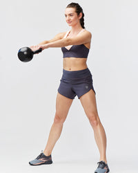 Black Excel women's workout shorts by Goal Five, training shorts with a comfortable fit and athletic design.