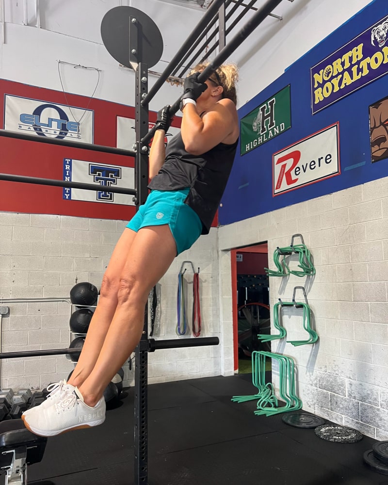 Black Excel women's training workout shorts by Goal Five, showing a close-up of the fitted athletic shorts with logo details.