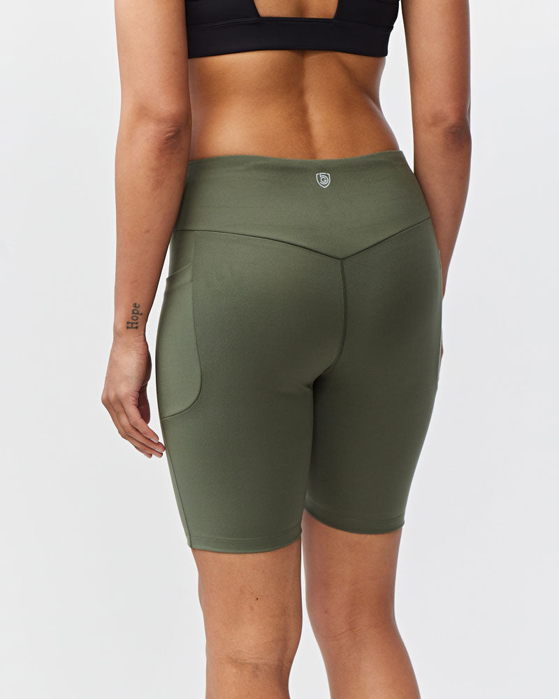 Goal Five Go Again Bike Short 8-inch training shorts in dark moss color, designed for comfortable active wear.