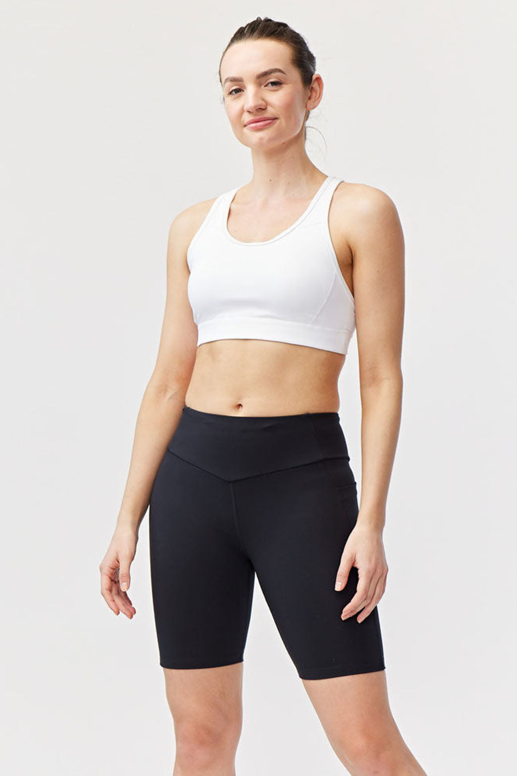 Black Goal Five Go Again Bike Short 8" training shorts with a fitted design, perfect for cycling and athletic activities.