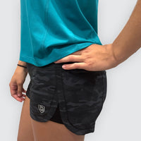 Goal Five women's training workout shorts in hot coral, lightweight and fast-drying for active fitness wear.