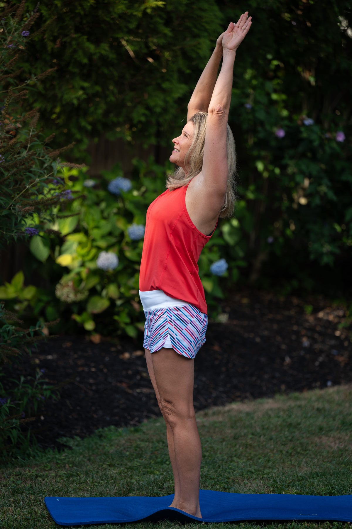 Goal Five women's training workout shorts in hot coral, lightweight and fast-drying for fitness and activewear.