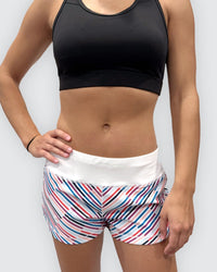 Goal Five women's training workout shorts in hot coral, lightweight and fast-drying, designed for active fitness and exercise.