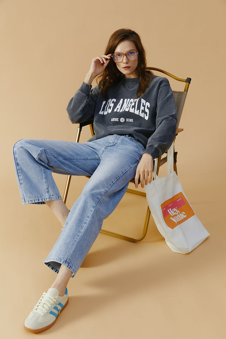 Hey Joanie High-Line Curve Ankle Jeans HJ016 with a high-rise fit and classic denim wash, styled on a model.