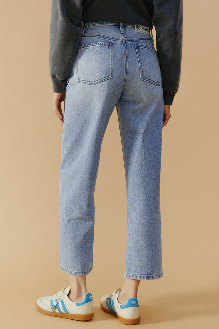 Hey Joanie High-Line Curve Ankle Jeans in denim, showcasing fitted silhouette and ankle-length cut on a model.