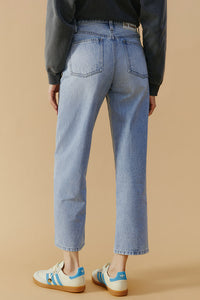 Hey Joanie High-Line Curve Ankle Jeans in denim, showcasing fitted silhouette and ankle-length cut on a model.