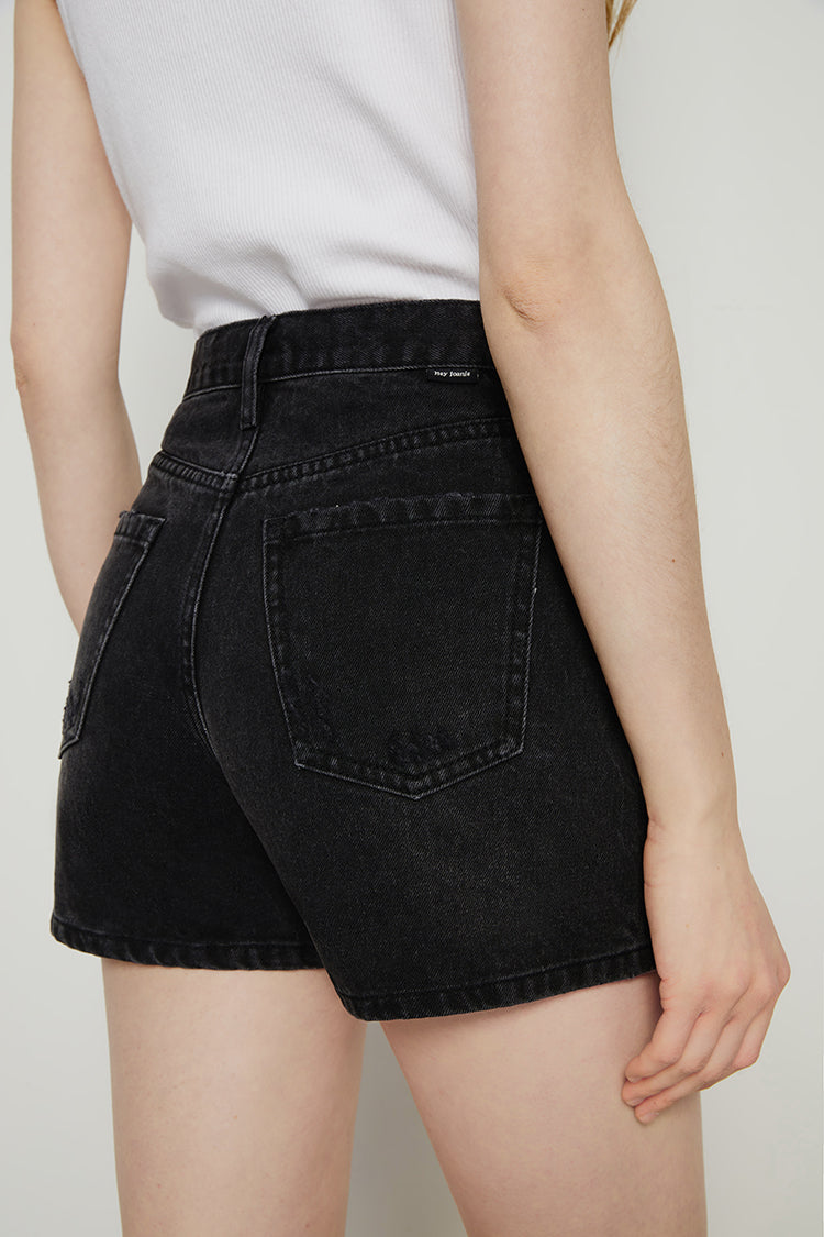 Hey Joanie Boyish Vintage High Rise Shorts in midnight hour denim, showing front view with distressed details and high-waist fit.