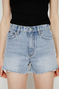 Light blue high-rise denim shorts by Hey Joanie with a relaxed fit and rolled hem, styled with casual summer accessories.