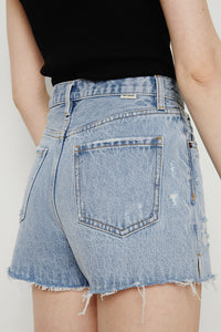 High rise denim shorts by Hey Joanie, with a light wash, frayed hem, and classic five-pocket style, perfect for casual summer wear.