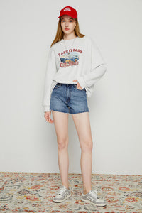 High-rise denim shorts by Hey Joanie, featuring a classic fit and distressed details, shown on a model.