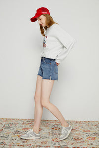 Hey Joanie high-rise denim shorts HJ167, light wash with frayed hem, styled for casual summer look.