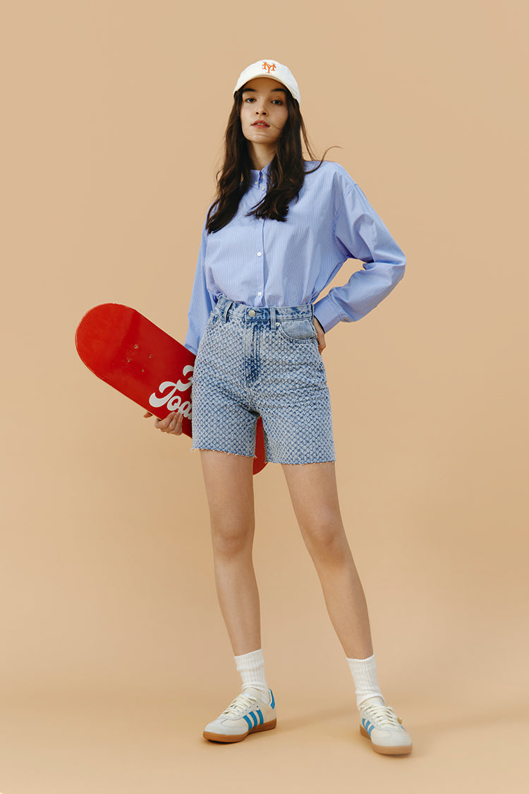 Hey Joanie Venice Tweed High Rise Shorts in a stylish tweed fabric, designed for a flattering fit and high-rise style.