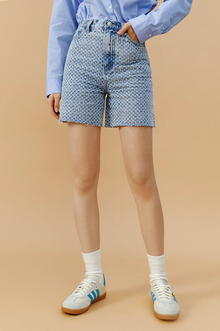 Hey Joanie Venice Tweed High Rise Shorts, stylish beige shorts with a high waist and tailored fit, perfect for warm weather.