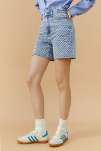 Hey Joanie Venice Tweed High Rise Shorts in a stylish tweed fabric, shown from the front on a white background.