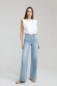 Hey Joanie Angeles High Rise Baggy Jeans with distressed details, shown on a model, showcasing relaxed fit and trendy style.
