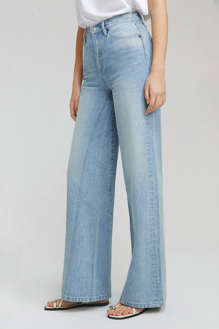 Hey Joanie Angeles High Rise Baggy Jeans with torn details, denim fabric, and relaxed fit, shown in a natural pose.