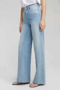Hey Joanie Angeles High Rise Baggy Jeans with torn details, denim fabric, and relaxed fit, shown in a natural pose.