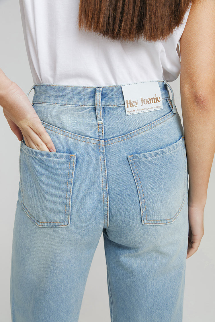 Hey Joanie Angeles High Rise Baggy Jeans with distressed details and relaxed fit, shown on a model.