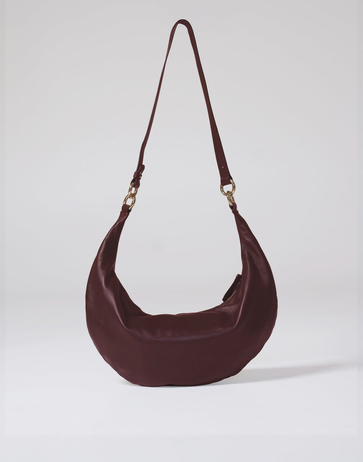 HYER GOODS Ring Bag hobo bag in burgundy leather, front view showing round ring handle and sleek design