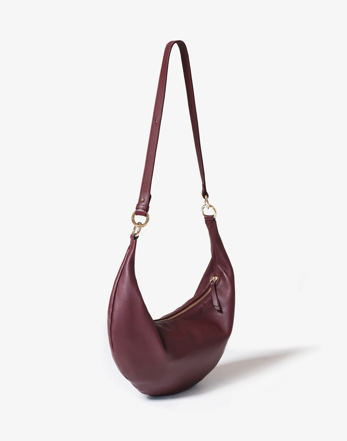 HYER GOODS Ring Bag hobo bag in burgundy with a circular handle and crossbody strap, stylish and versatile accessory.