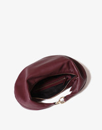 HYER GOODS burgundy Ring Bag hobo style with interior view, showcasing its stylish design and spacious interior.