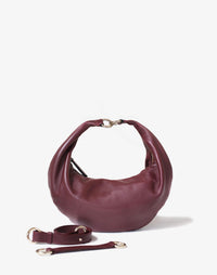 HYER GOODS Burgundy Ring Bag hobo style with adjustable straps, stylish and versatile for everyday use