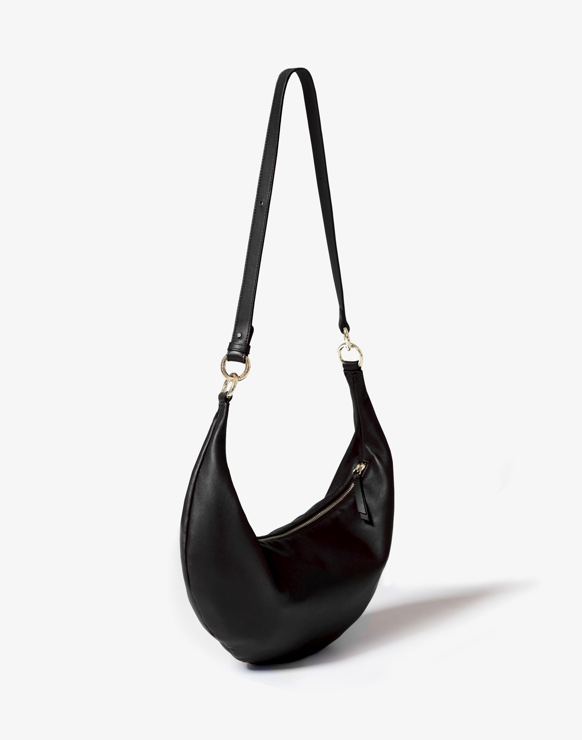 Black and gold hobo bag with a circular ring detail, stylish crossbody design by HYER GOODS.